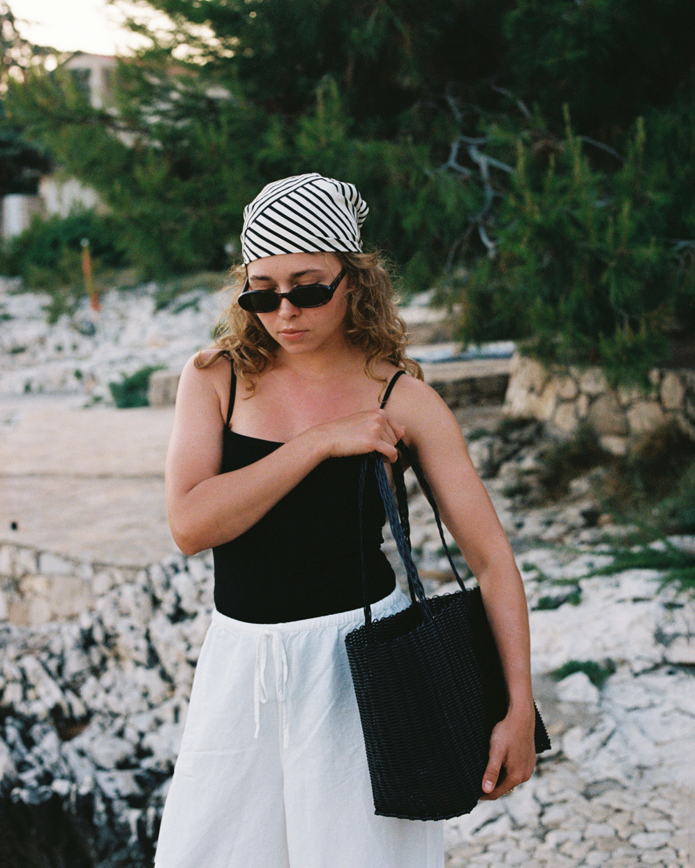 Medium colourful woven plastic bags handmade in El Salvador.